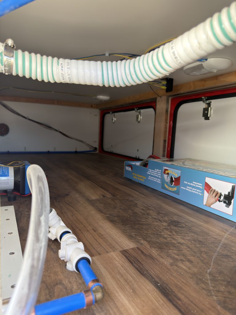 Open Exterior Storage with Water Tanks and Plumbing (View 1) in Nielsen Camp #133
