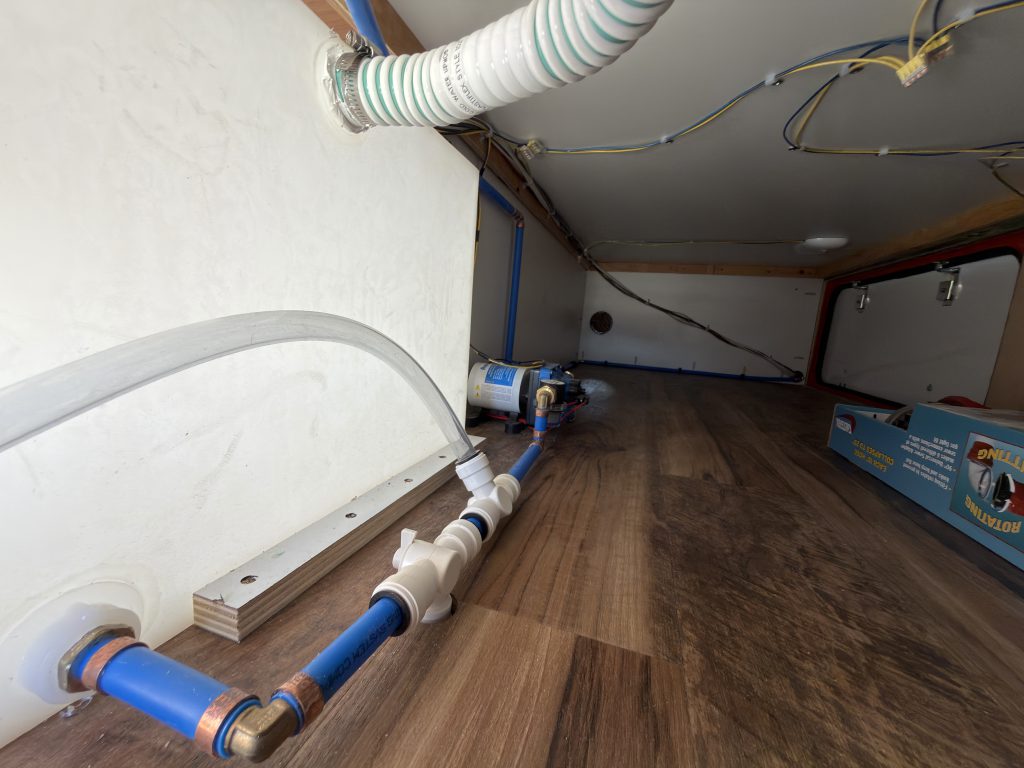 Open Exterior Storage with Water Tanks and Plumbing (View 2) in Nielsen Camp #133