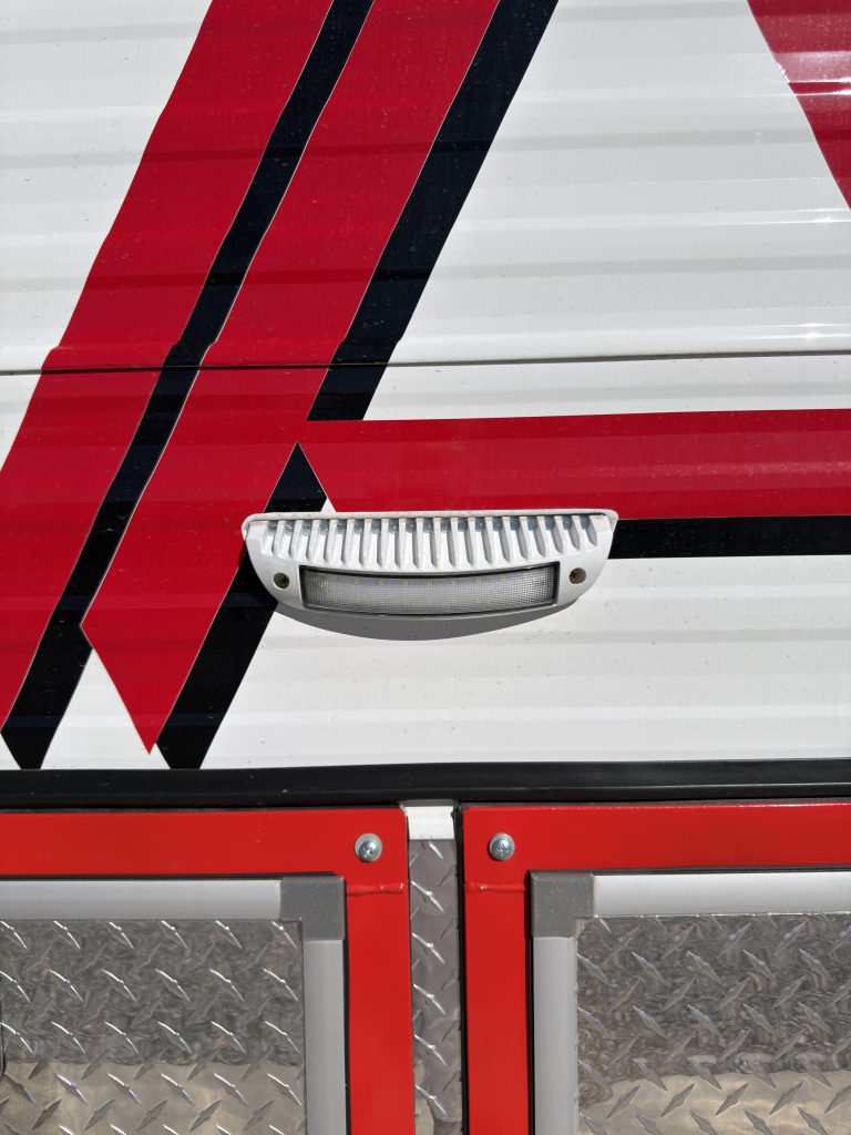 Curb-side exterior compartment light on Nielsen Camp #133