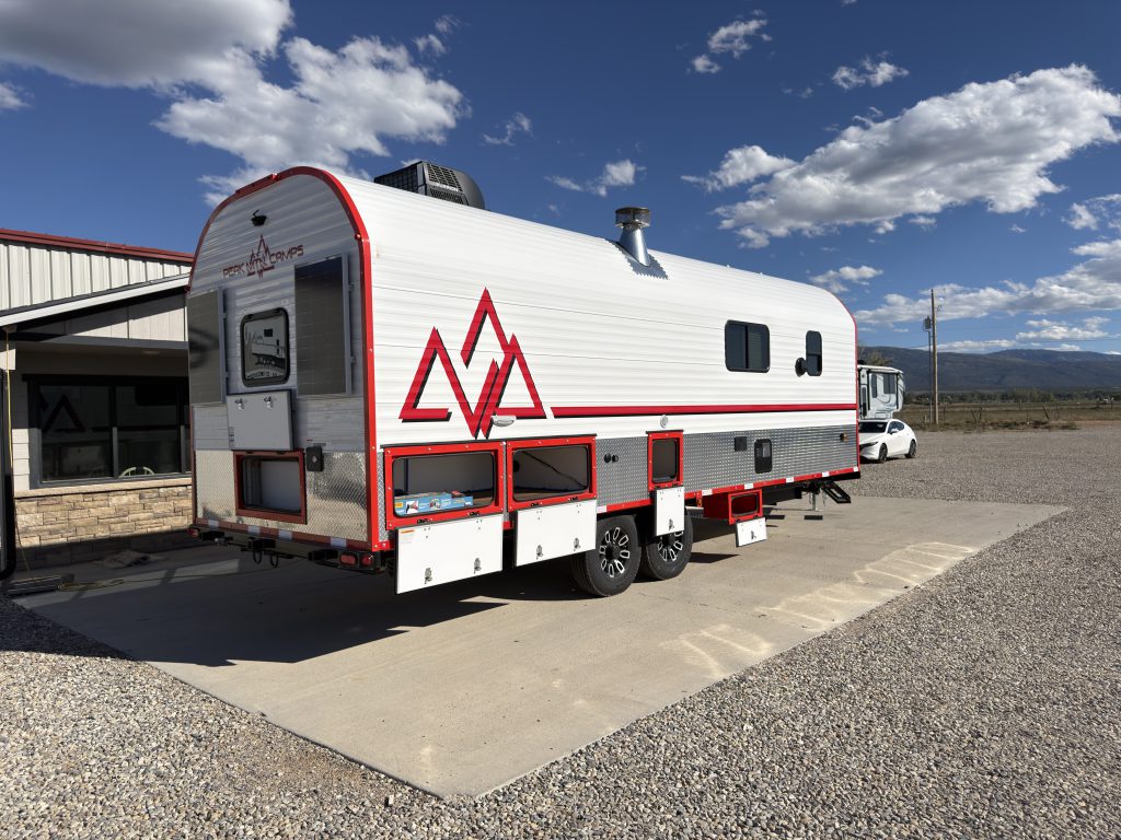 Road-Side Rear Three-Quarter Exterior with Open Storage on Nielsen Camp #133