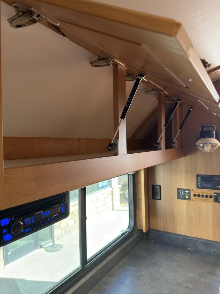 Gas-Strut Cabinet above Bar (Wide View) in Nielsen Camp #133