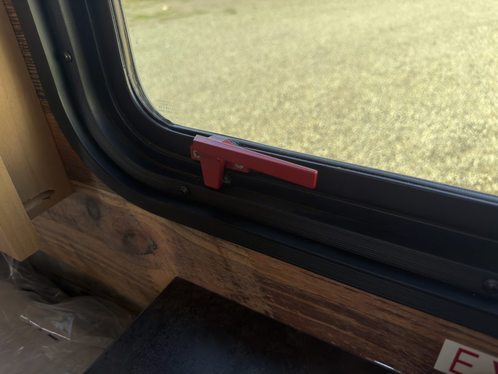 Egress Window Latch on Nielsen Camp #133 (View 1)
