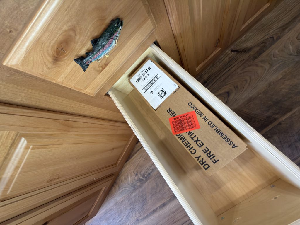 Fire extinguisher storage in Nielsen Camp #133