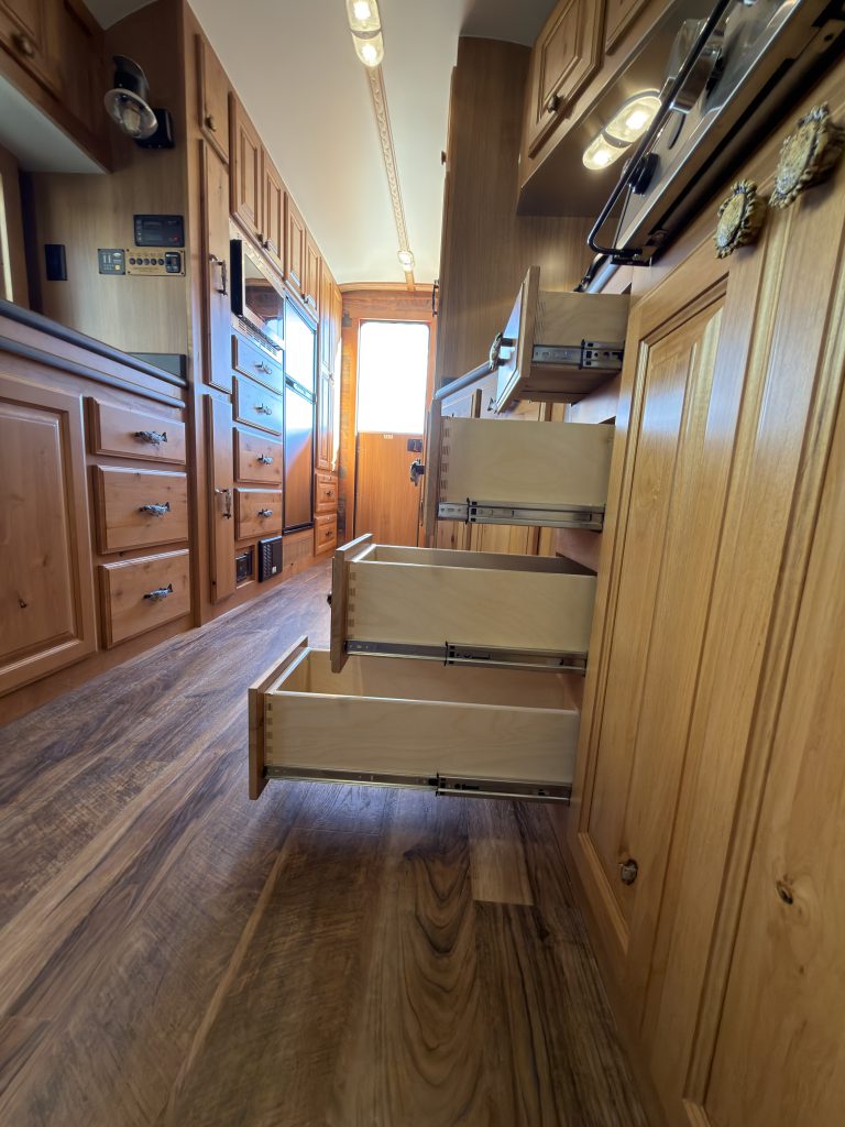 Open Kitchen Drawers Along Main Aisle in Nielsen Camp #133