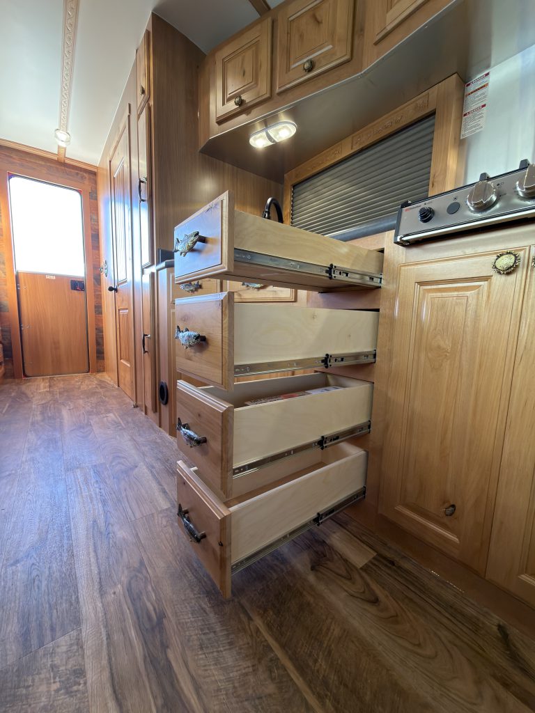 Open Drawers Beside Sink in Nielsen Camp #133