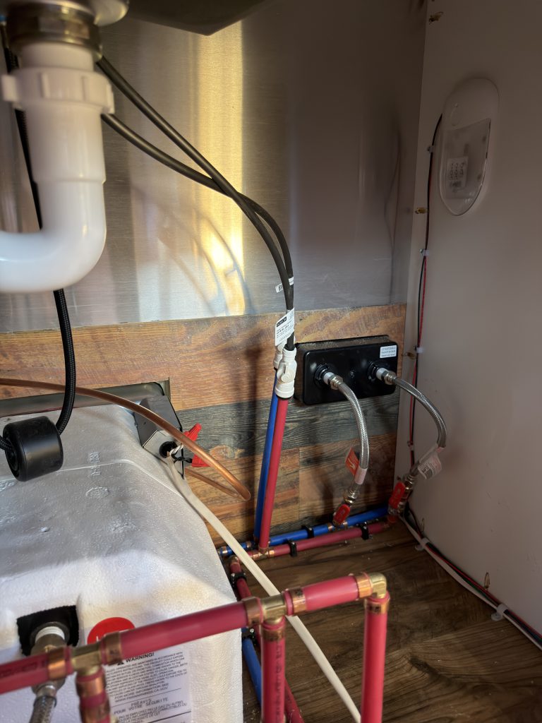 Under-Sink Water Lines and Drain Plumbing in Nielsen Camp #133