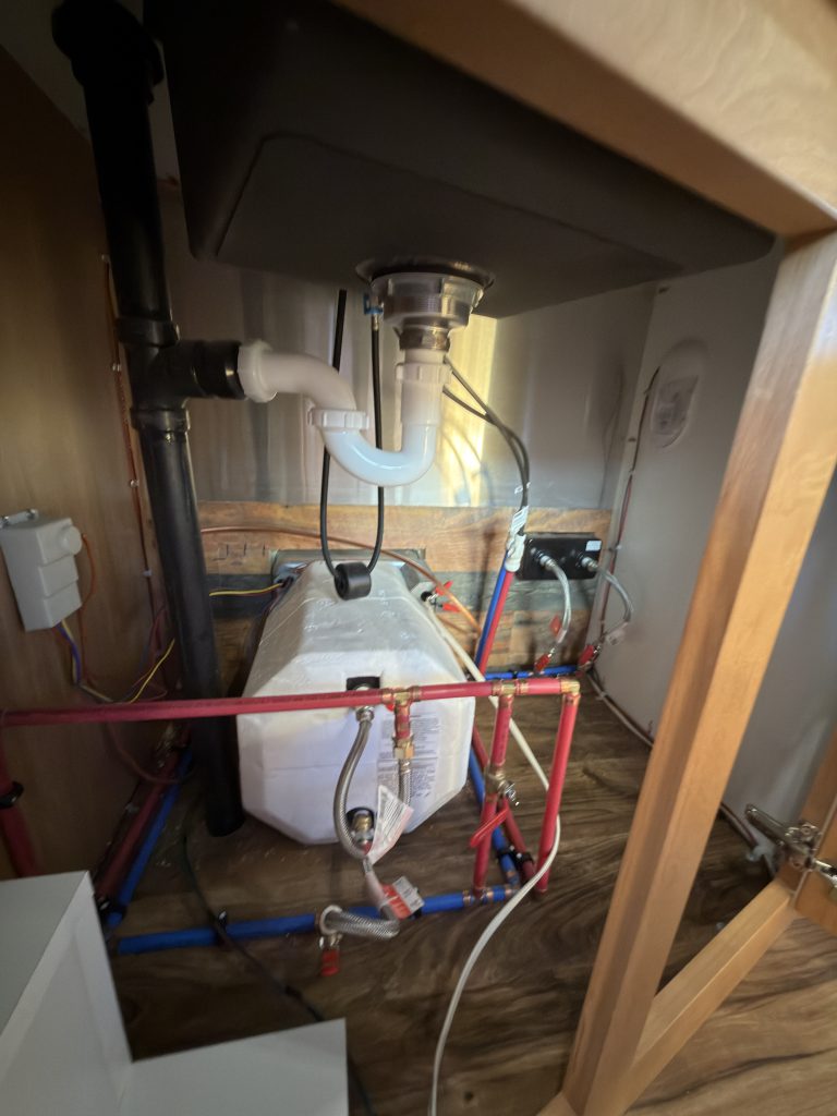 Under-Sink Water Heater and Supply Lines in Nielsen Camp #133