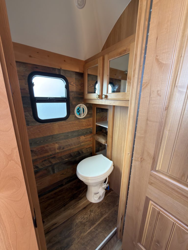 Bathroom And Porcelain Toilet on Nielsen Camp #133 (View 1)