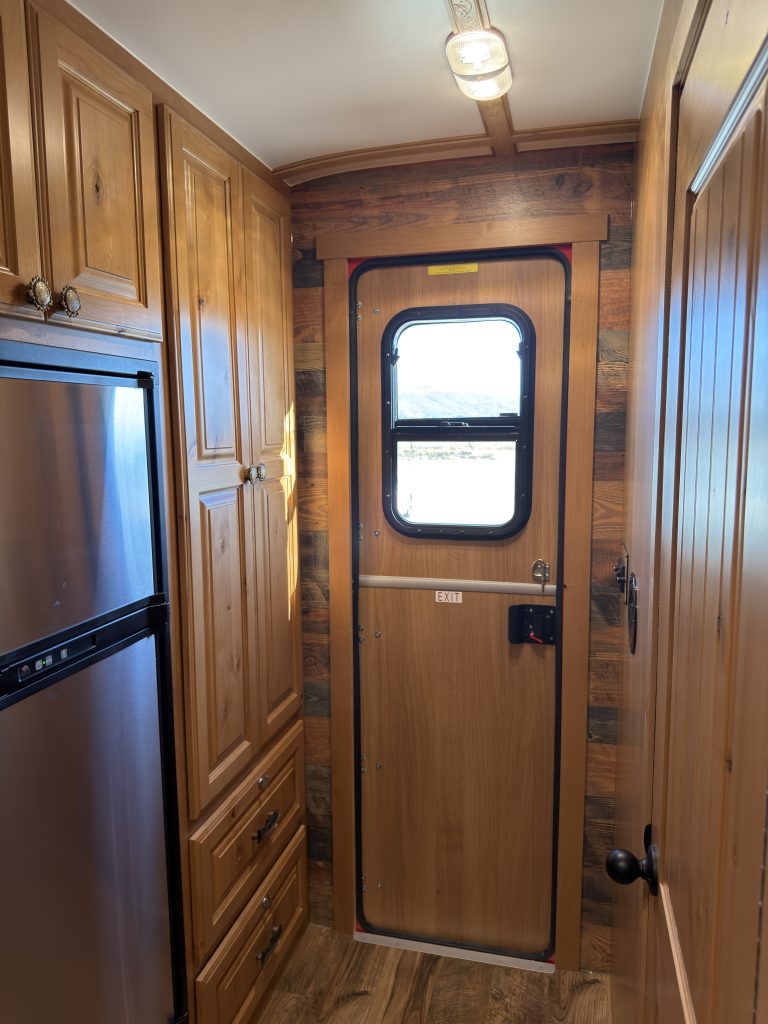 Rear Interior Door beside Refrigerator in Nielsen Camp #133