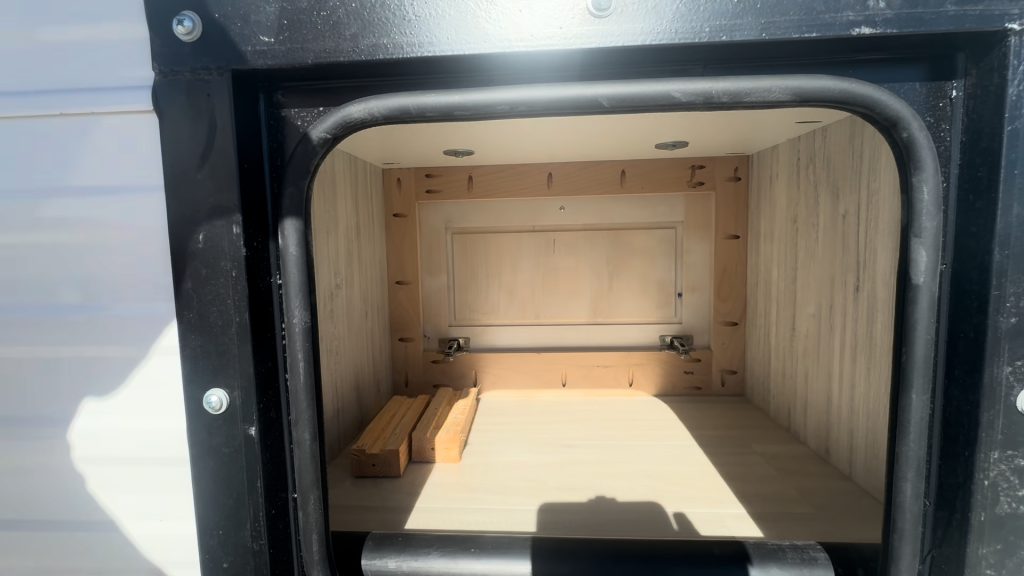 Open exterior wood box with finished wood interior.