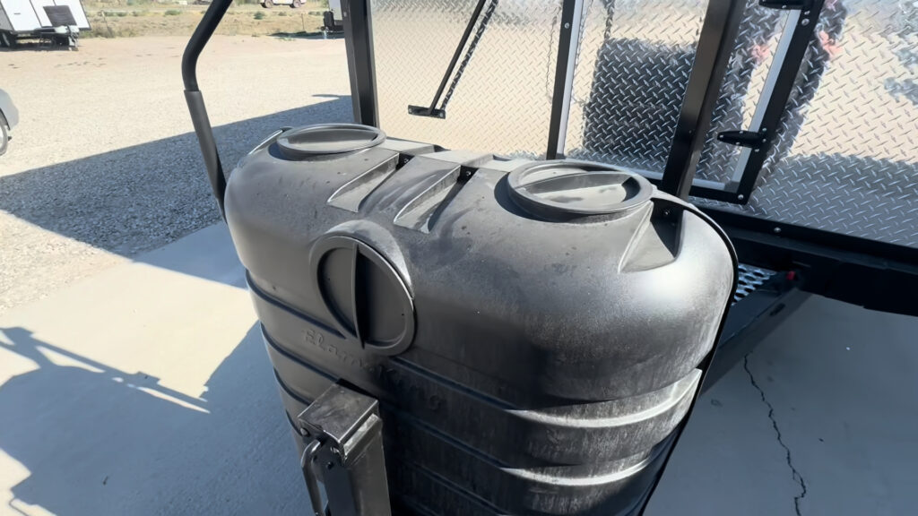Close view of the molded propane cover and its top openings on the Kendall Camp tongue.
