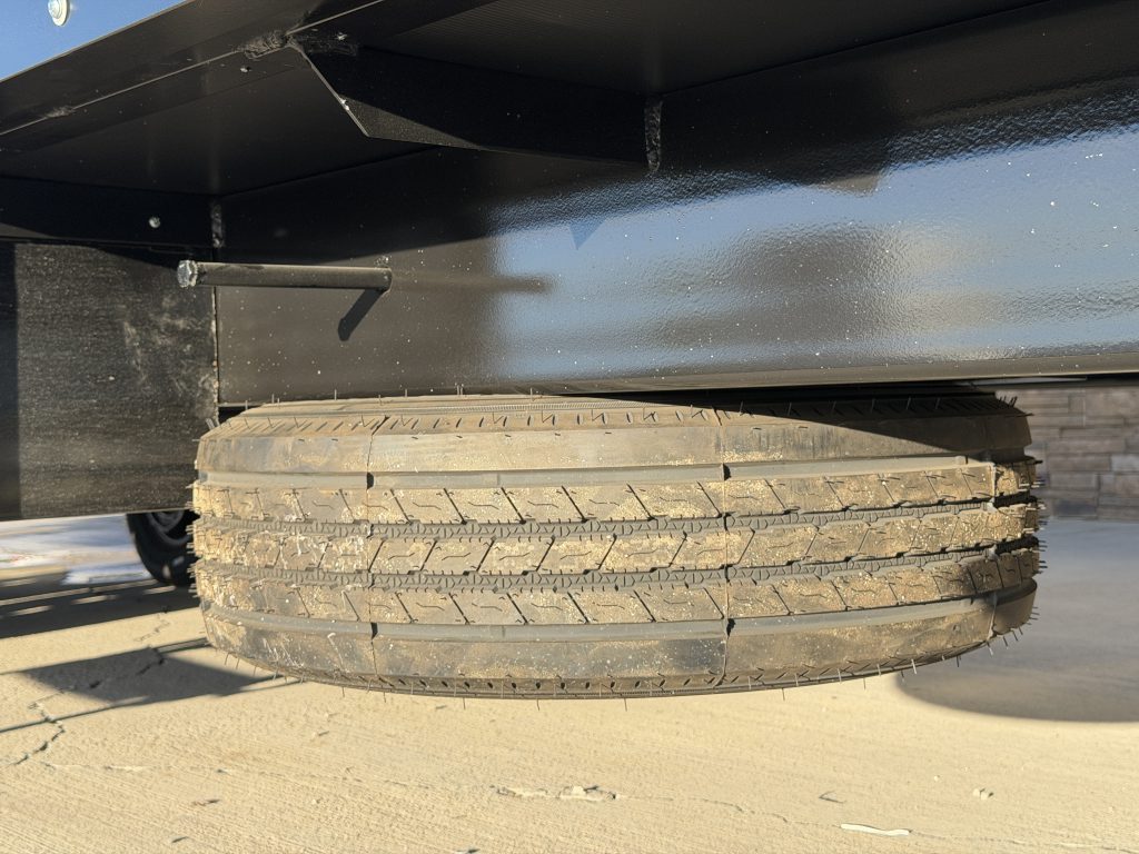 Undercarriage view of the spare tire and frame in Keulen Camp #132.