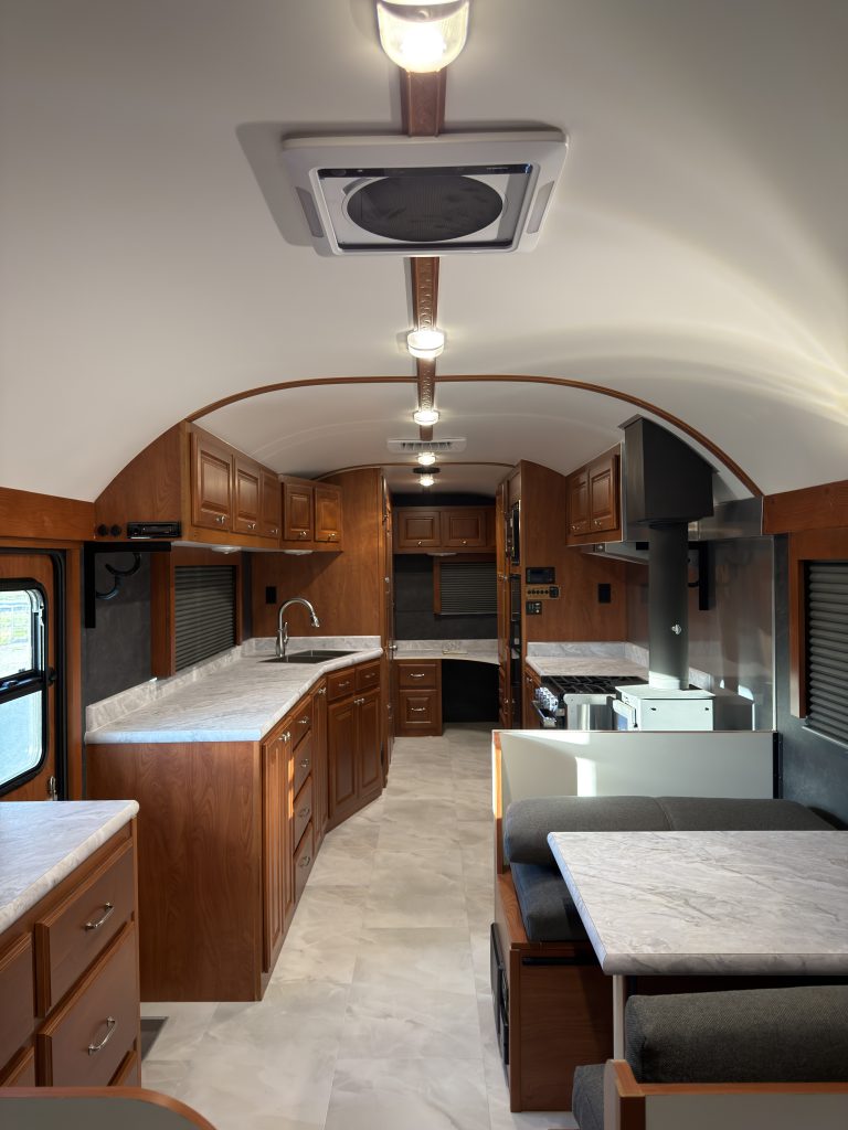 View from the dinette toward the kitchen and long counter in Keulen Camp #132.