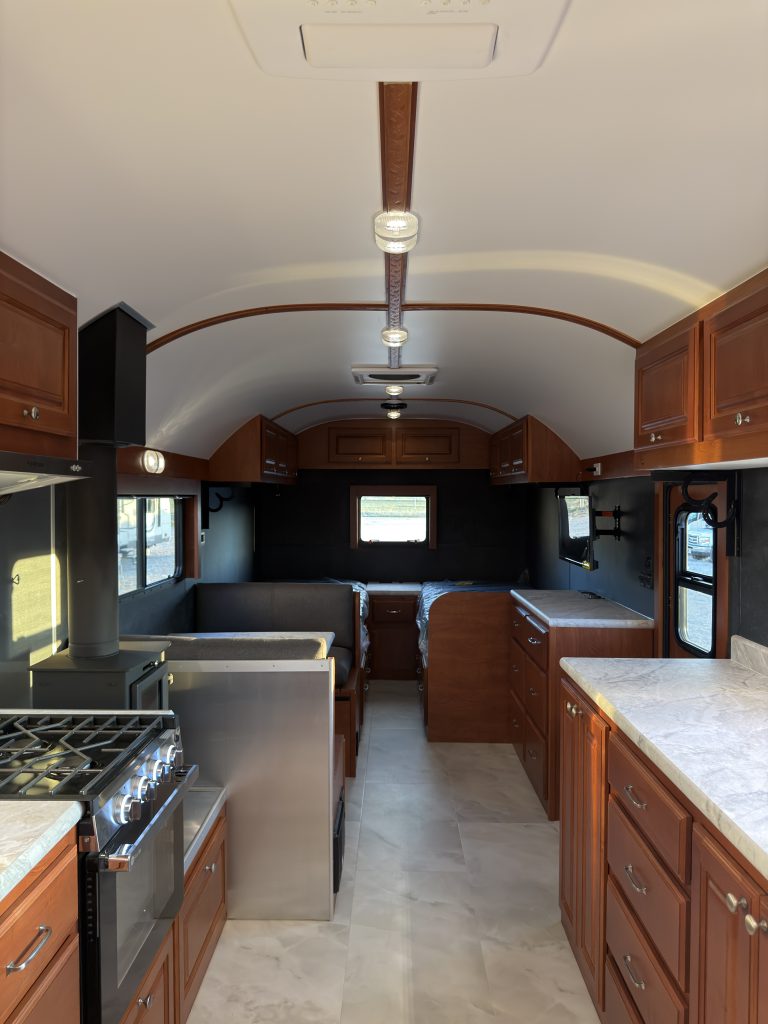 View along the cabin aisle toward the twin sleeping area in Keulen Camp #132.