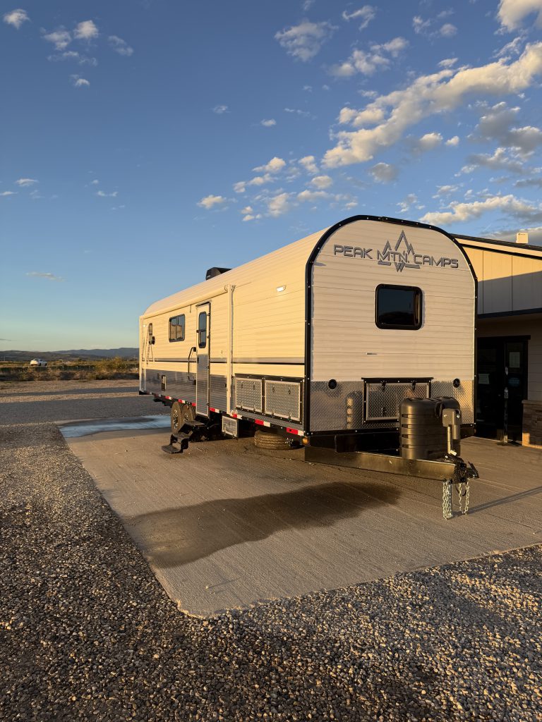 Front three-quarter exterior in warm evening light in Keulen Camp #132.