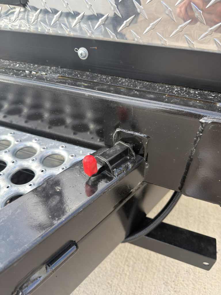 Van Niewkoop Camp #136: Angle support and latch for the removable tongue decking used to access storage below.