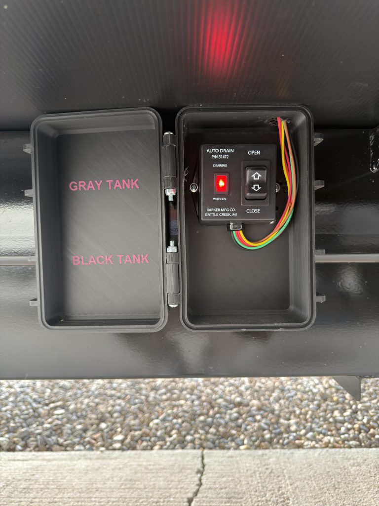 Van Niewkoop Camp #136: Electric waste-gate switches mounted beneath the camp for operating the holding-tank outlets.