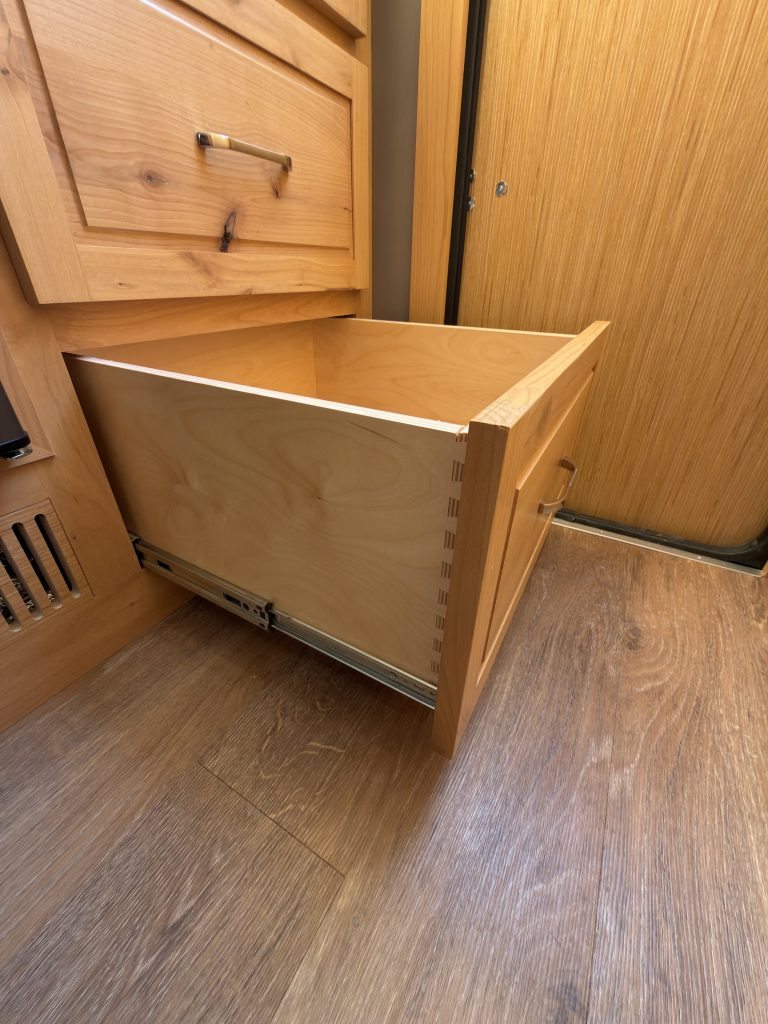 Van Niewkoop Camp #136: Deep lower entry drawer extended to show its dovetail corner construction.