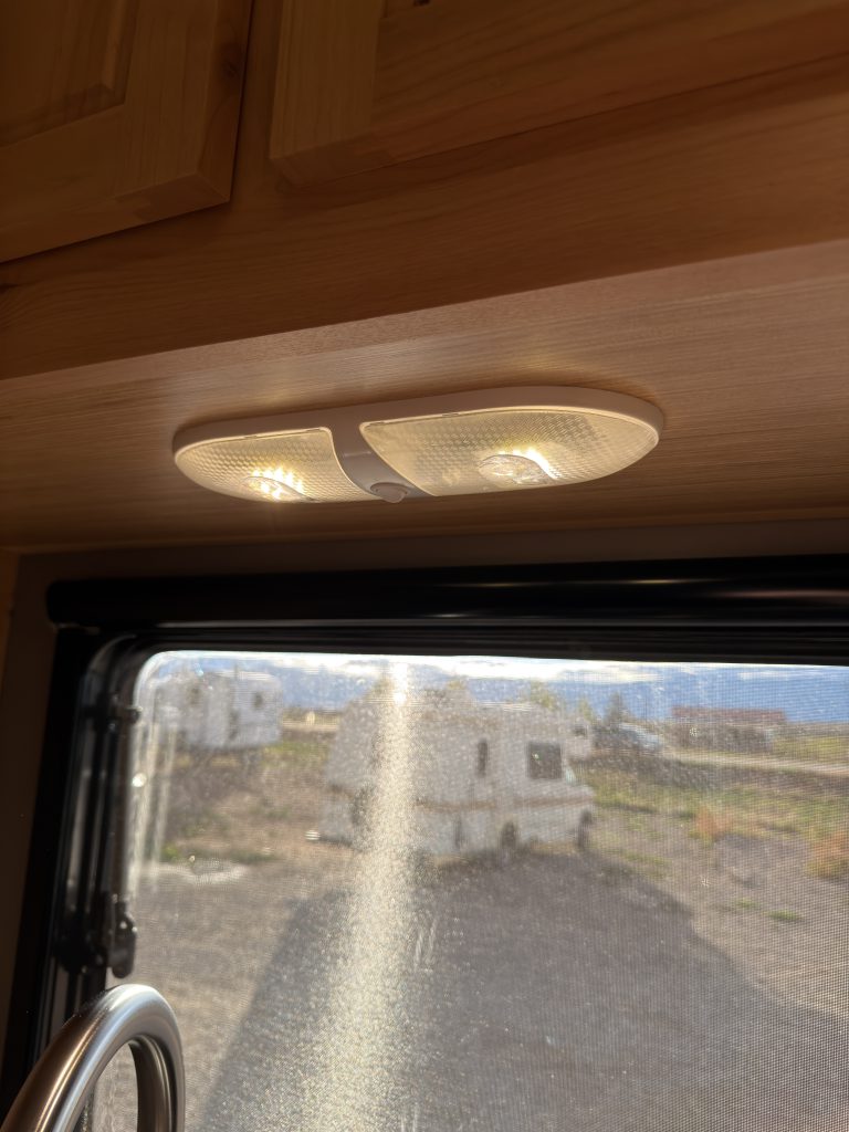 Van Niewkoop Camp #136: LED fixture beneath the upper cabinet above the kitchen window.