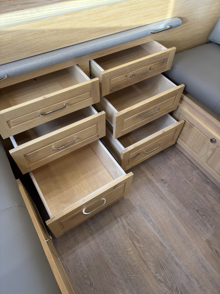 Van Niewkoop Camp #136: Angled view of the open under-bed drawers and their dovetail construction.