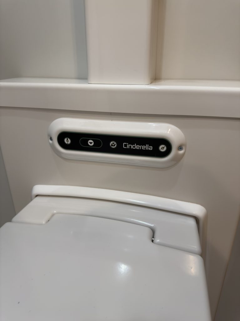Van Niewkoop Camp #136: Close view of the controls on the Cinderella incinerating travel toilet.